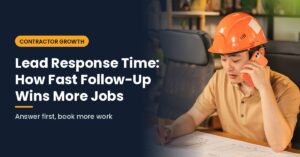 Lead response time - contractor in a hard hat returning a customer call while reviewing plans